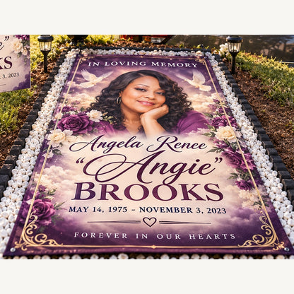 Long printed memorial grave banner displayed lengthwise at a gravesite